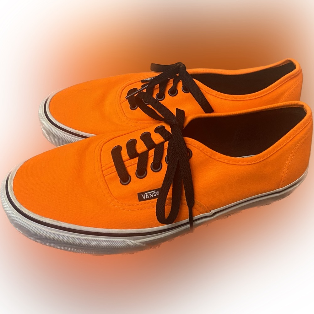 VANS never been worn, brand new, neon orange. 8.5 men’s 10 women’s